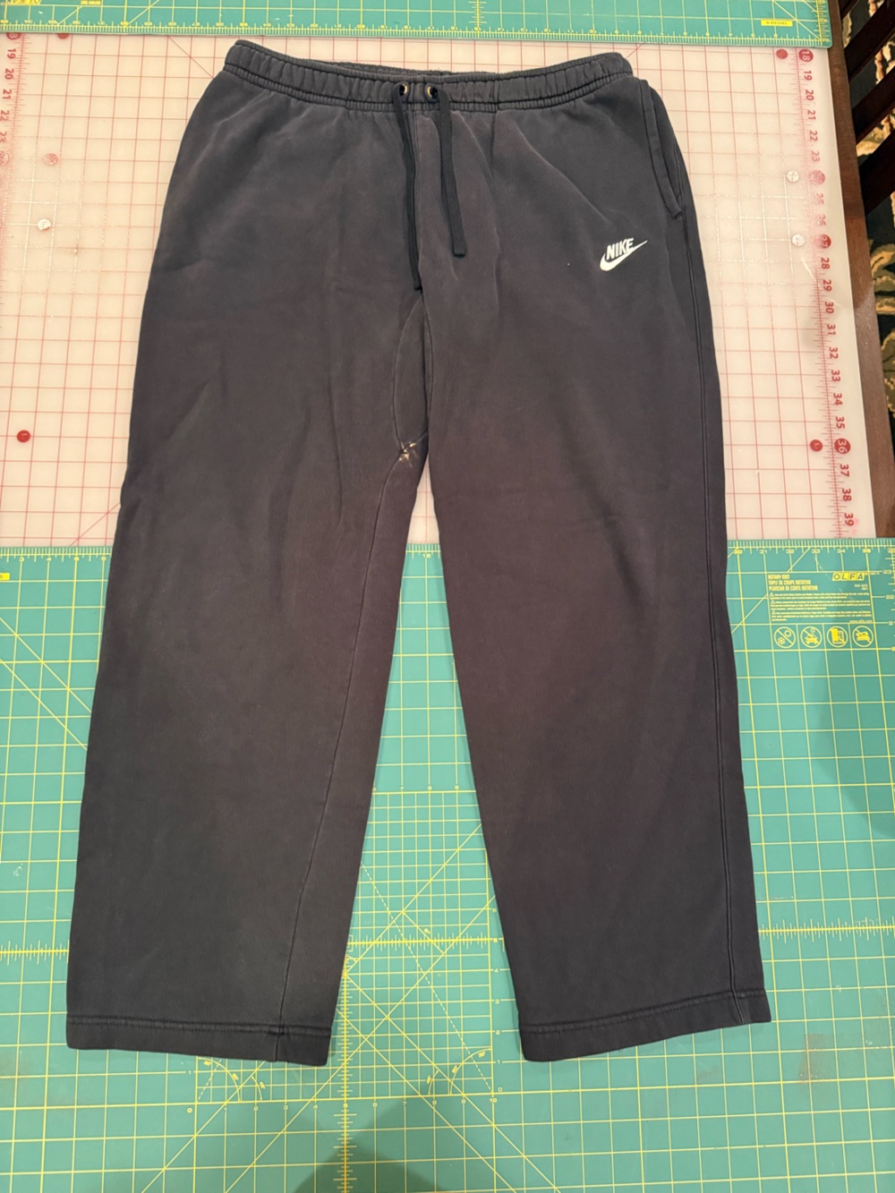 Nike Dark Gray Sweatpants with White Swoosh Logo